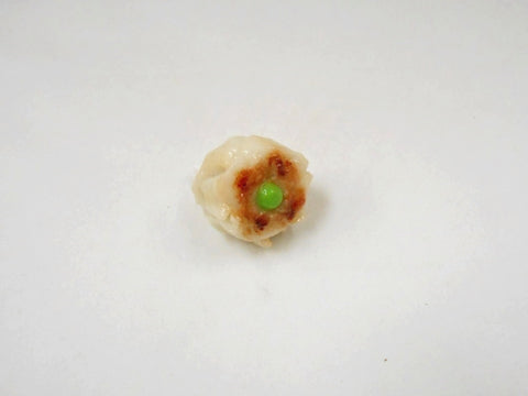 Steamed Pork Dumpling with Green Pea Plug Cover